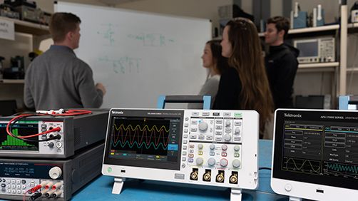 Students learning engineering concepts with the TBS2000B education oscilloscope